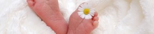 Baby's foot with flower