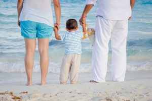 Survival guide for ivf (img): family with baby on beach