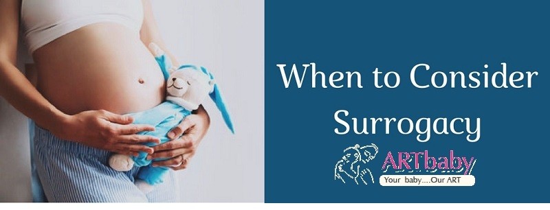 What is Surrogacy. A pregnant mother with a baby toy.