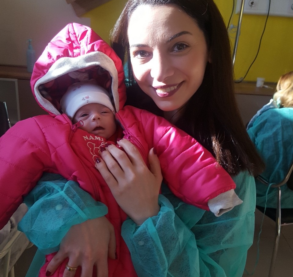 Tamuna, ARTbaby Georgia staff holding Brazilian surrogate baby: Pic Surrogacy success story